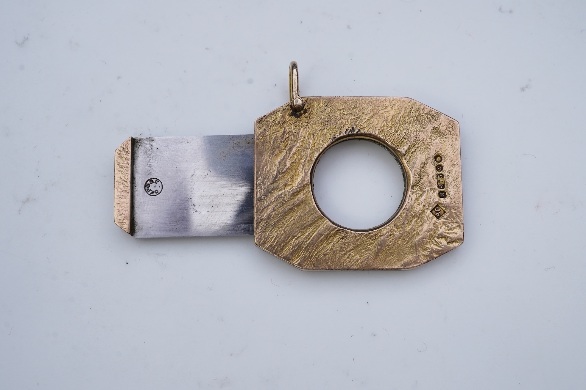 Dunhill, a 9ct gold and steel cigar cutter, circa 1968